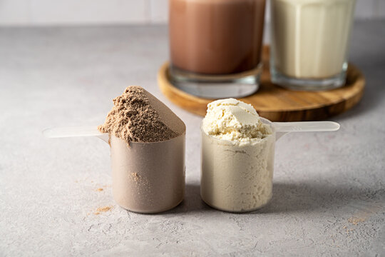 Protein powder and protein drinks, with scoops. Food supplement, bodybuilding, fitness and sport