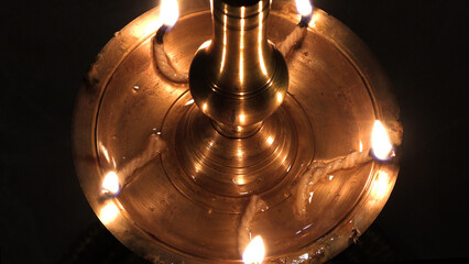 Nilavilakku, the lighted traditional bell metal antique lamp