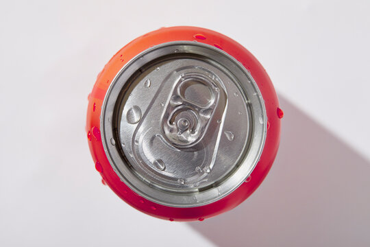 Overhead view of can of soda on white background
