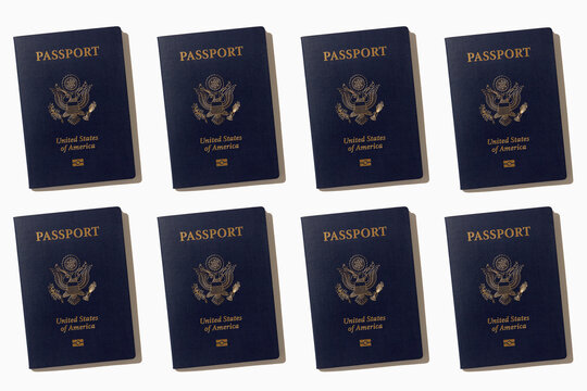 Rows of American passports on white background