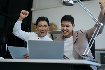 businesspeople coworker in office Happy to be successful partnership teamwork success concept.
