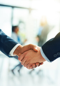 Welcome, business people and handshake in office meeting for b2b, crm or networking. Hiring, job interview or men shaking hands for recruitment, deal or contract offer, collaboration and partnership