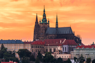 The Prague castle and the St. Vitus Cathedral in UNESCO site Prague in sunset. - obrazy, fototapety, plakaty