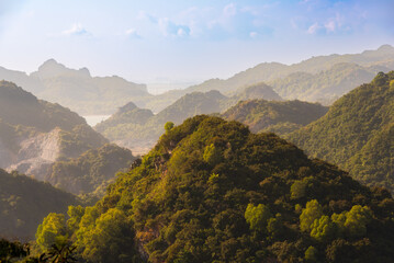 Green mountains covered with tropical rainforest in Vietnam