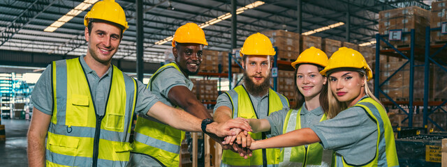 Large group of professional business corporate team showing unity with their hands together,...