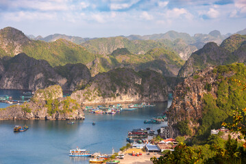 Sea landscape in Vietnam with many small islands and boats. View from above
