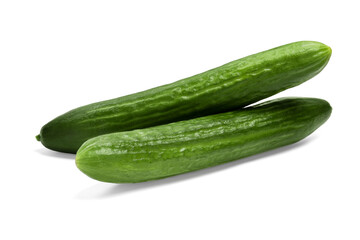 Two long fresh cucumbers isolated on white