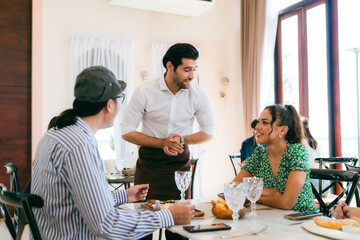Engaging Service at the Eatery, Clients Enjoying Conversations while Waitstaff Attend, Cafe Scene...