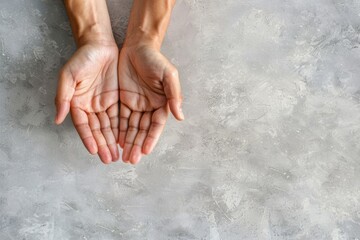Empty Hands Cupped Together in Top View on Gray Background - Male Hands Showing Open and Giving Gesture