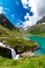 View of the Turquoise Blue Lake Kartell and a waterfall
