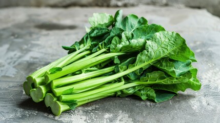 Fresh Chinese Broccoli Isolated on White Background for Healthy Cooking and Fries. Green and Nutritious Choi