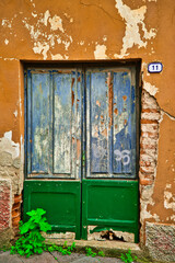 very ruined front door in need of renovation