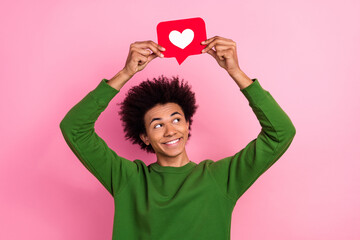 Photo of happy positive guy demonstrate heart like above head look isolated pastel color background