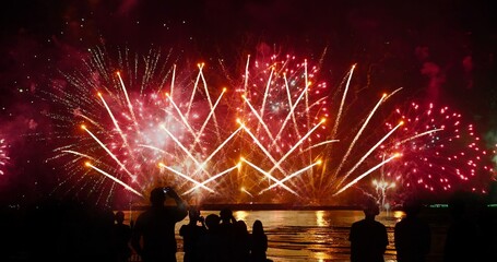 Red Firework celebrate anniversary happy new year 2024, 4th of july holiday festival. red firework in night time celebrate national holiday. Countdown to new year 2024 festival party time event