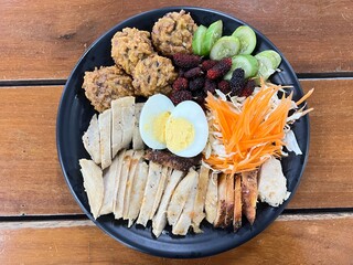 Baked chicken breast, boiled egg with baked egg mixed rice berry and mulberry salad