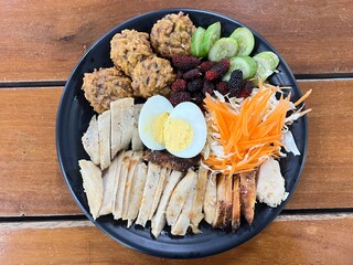 Baked chicken breast, boiled egg with baked egg mixed rice berry and mulberry salad