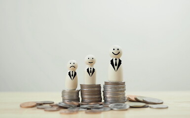 Businessman smile and standing on higher coins stacking more than everyone sad for unequal gender...