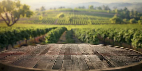 Fotobehang Rustic wooden barrel offers a stage for products with a lush vineyard landscape softly focused in the distance, suggests winemaking © gunzexx