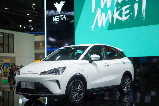 Bangkok, Thailand - April 5th, 2024: Neta V II electric car on display at the Motor Show 2024.