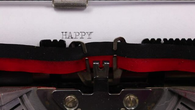 large text HAPPY BIRTHDAY written with a vintage typewriter with black ink
