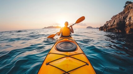 Kayaker man paddling kayak at sunset sea   serene water sport adventure on tranquil ocean - obrazy, fototapety, plakaty