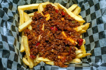 fries alone and with minced meat bolognese sauce mozzarella cheddar cheese and bacon 