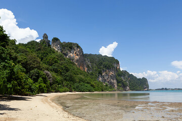 Krabi province, Thailand. Landscape o the way to Railay beach. Jungle green limestone cliffs and...