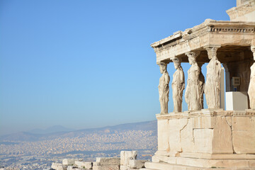 
antique columns in the shape of people from ancient Greece