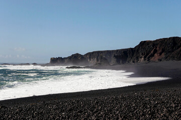Fototapeta na wymiar waves on shore at south coast black beach in Iceland