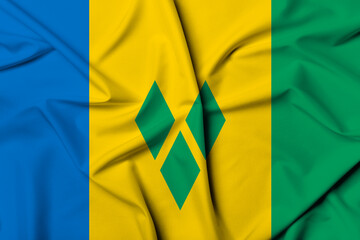 Beautifully waving and striped Saint Vincent and the Grenadines flag, flag background texture with...