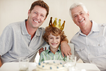 Father, boy and grandfather in portrait at birthday party for smile, hug or crown for kid in family...