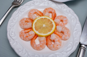 Catch of the day, fresh cooked shrimps served with lemon and garlic sauce in seafood restaurant