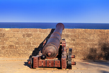 Beautiful blue sky and look like old time. movable sixteenth century Portuguese cannon made of...