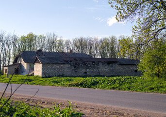 Photo of abandoned buildings near the road