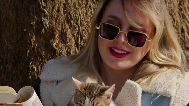 Young Woman and Sweet Cat in Nature