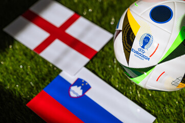 Fototapeta premium England vs Slovenia, Euro 2024 Group C football match at Cologne Stadium, Cologne, 25 June 2024, official ball on green grass