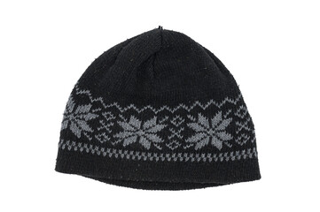 Detail of a black wool hat with winter drawings and patterns on a white background