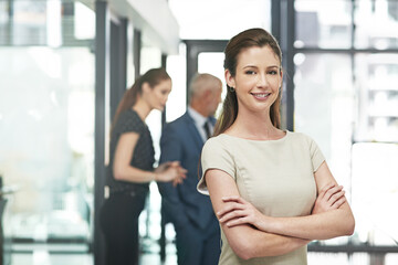 Business, office and portrait of woman with arms crossed for company, pride and job at work. Happy, attorney and female employee with smile for legal career, corporate and confidence at law firm
