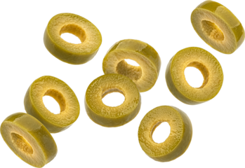 Falling green olive slices isolated