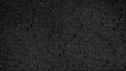 stone cladding wall made of regular black bricks. wall panels for interior or exterior decoration, background and texture. dark black wall made from grunge stone material for modern style decoration.