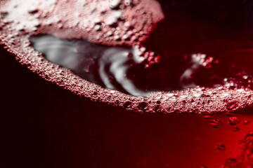 Red wine abstract splashing in glass. - 787408183