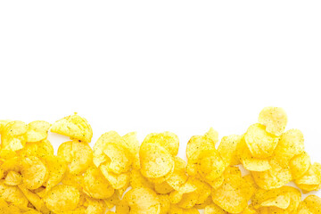 Snack background with crispy potato chips, top view