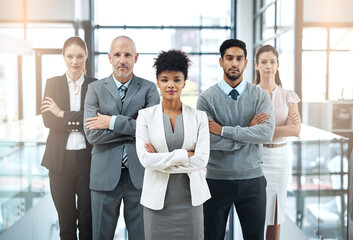 Office, team and portrait of business people with arms crossed for leadership, collaboration and pride. Diversity, company and serious employee with confidence for career, commitment and partnership