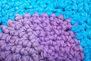 blue and purple crocheted wool texture