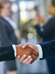 Business people, closeup or shaking hands for partnership deal in company building with welcome or...