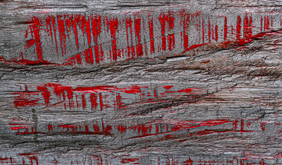 Wood plank with red paint marks texture