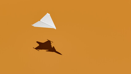 Paper airplane with shadow of military aircraft, origami, yellow background
