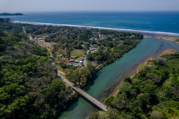 Beautiful aerial view of Dominican Beach and the Baru river in Costa Rica 