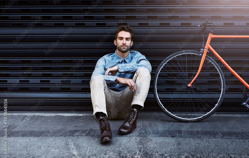 Sticker Portrait, man and fashion with bicycle by wall for transport of creative business worker by lens flare. Confident, male person and beauty with elegant clothing leaning grey brick for designer career