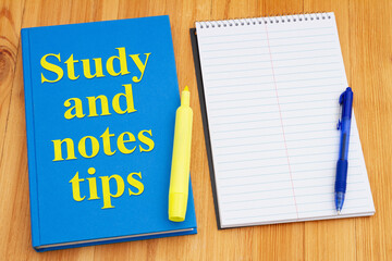 Study and Notes Tips with retro old blue book with highlighter marker on a desk - 787447139